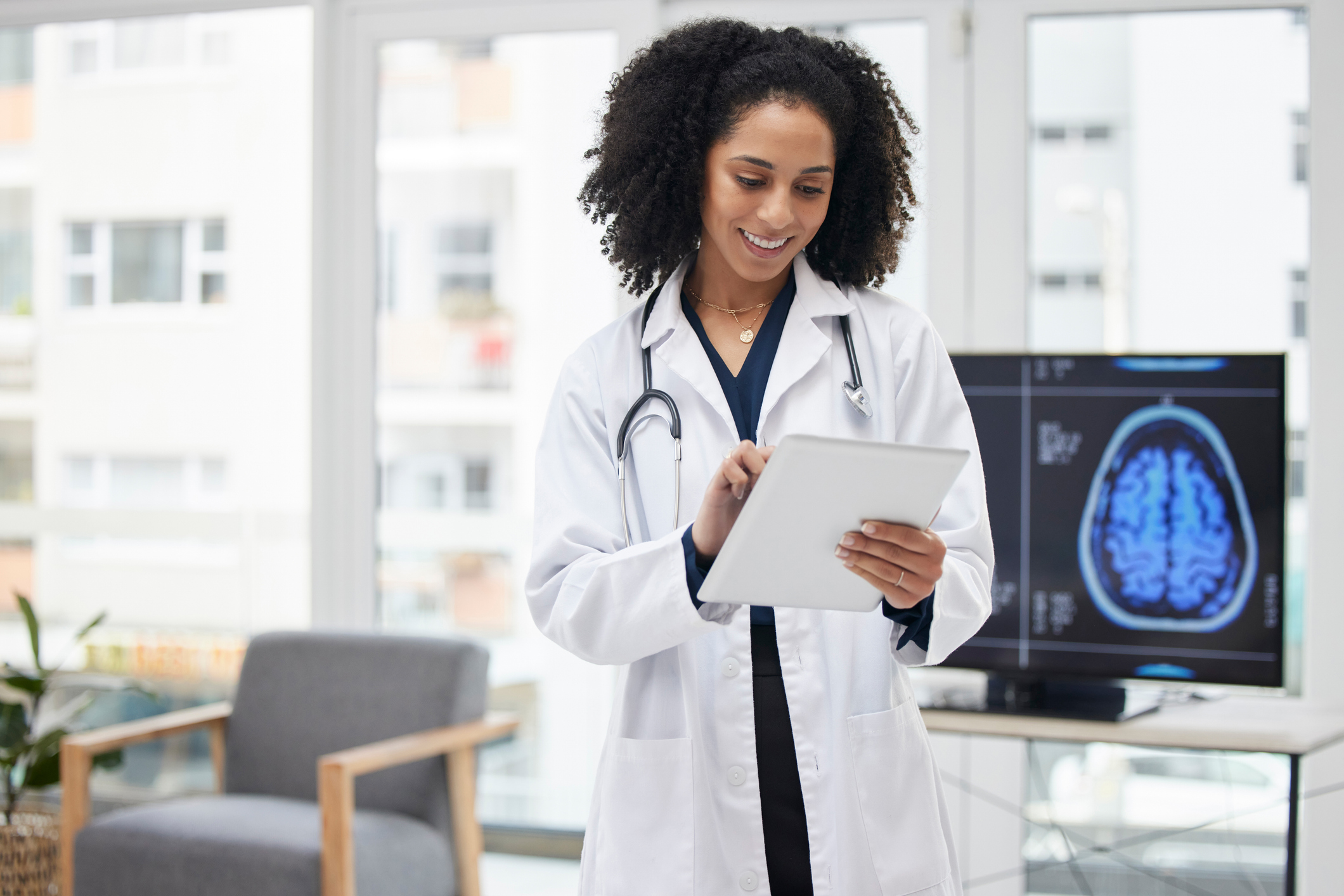 Scientist studying brain imaging in a research laboratory